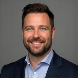 Professional headshot of Lucas Favre
